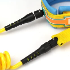 LEASH DE SUP HOWZIT COIL JAUNE/BLEU 9' -Kayak Libre Magasin leash de sup howzit coil jaune bleu 9 1 5