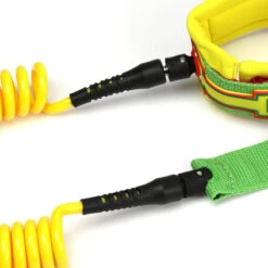 LEASH DE SUP HOWZIT COIL RASTA 9' 14 LEASH DE SUP HOWZIT COIL RASTA 9' -Kayak Libre Magasin leash de sup howzit coil rasta 9 1 5